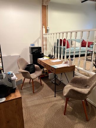 photo glendale office, two tan chairs, wood desk, fax machine